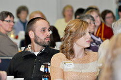 Christine Lopez, coordinator of the Gabriel Project at SS. Francis and Clare Parish in Greenwood, and her husband, Ryan, listen as Marianne Anderson shares her experiences working for the state’s largest abortion provider during a Great Lakes Gabriel Project dinner on Feb. 6 in Indianapolis. (Photo by Natalie Hoefer)