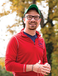 Seminarian Liam Hosty smiles during an Oct. 9 pilgrimage to the Shrine of Our Lady of Monte Cassino near St. Meinrad made by seminarians at Saint Meinrad Seminary and School of Theology in St. Meinrad. The shrine is on a hill just outside the southern Indiana town. The seminarians prayed for an end to the coronavirus pandemic and for those whose lives have been affected by it. (Photo courtesy of Saint Meinrad Archabbey)