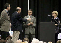 Evansville Mayor Lloyd Winnecke, second from right, talks about the Mental Health Commission he is co-chairing with Wyeth Hatfield, left, of ECHO Community Health in Evansville. The Message photo by Tim Lilley.